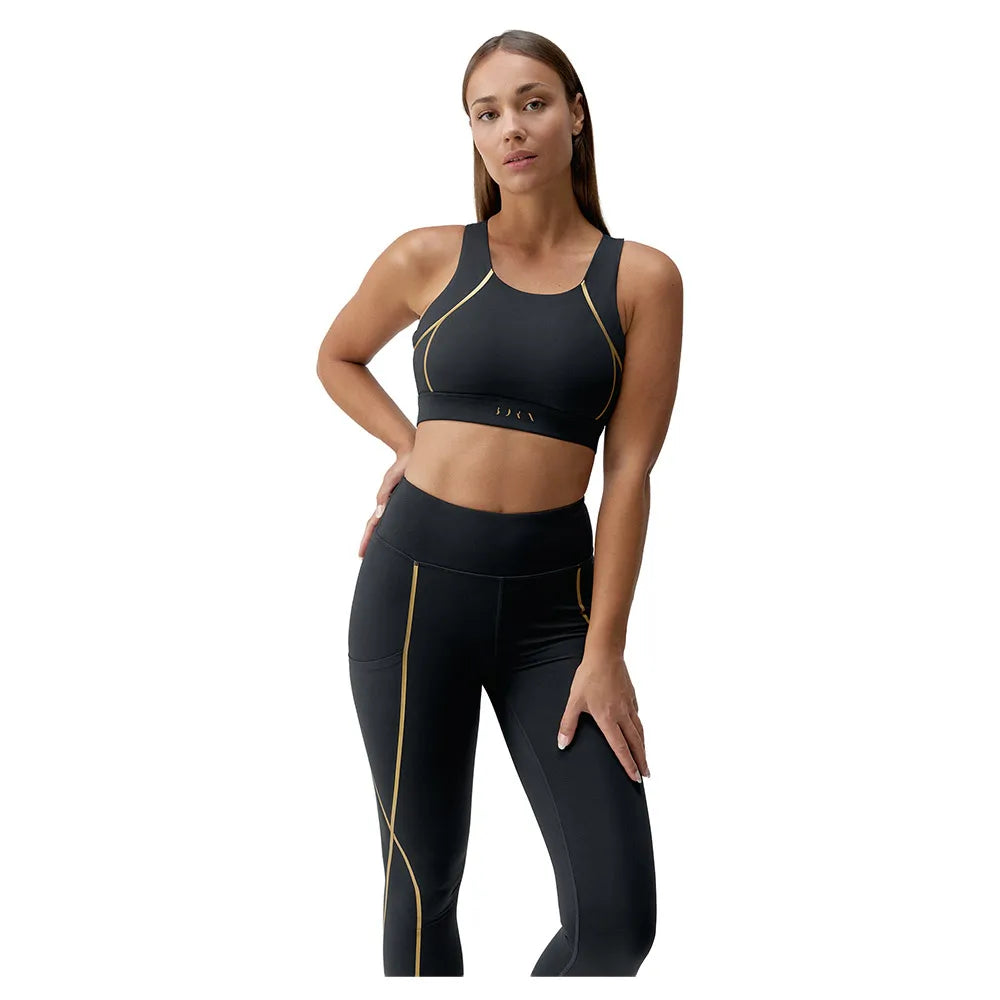 Born living yoga Gold high support sports top